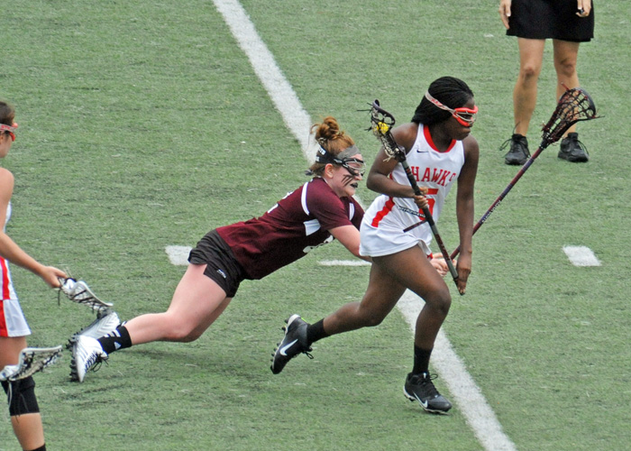 Candace Williams had three goals, two draw controls and two ground balls in Sunday's 20-16 loss to Alma College. (Photo by Wesley Lyle)