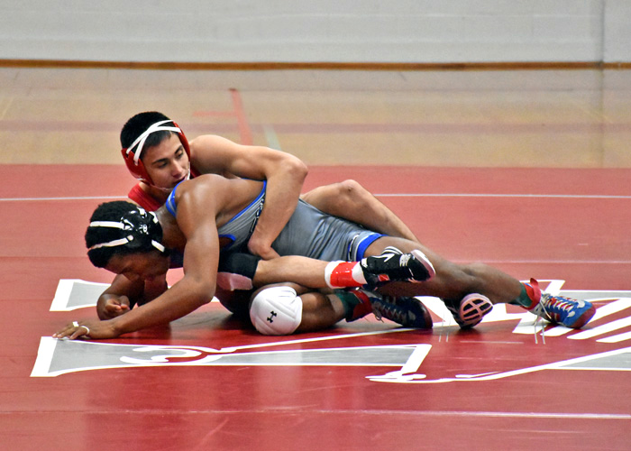 Brandon Abejon, shown here last season, won three matches for the Hawks on Saturday in the Gator Boots Dual. (Photo by Wesley Lyle)