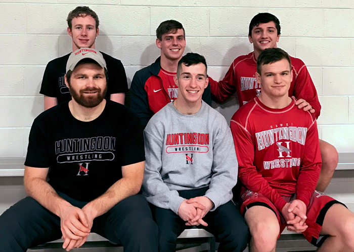 Huntingdon's senior wrestling class has been a part of the first 23 dual-match wins in program history. The fifth-year Hawks set a program record with eight victories this season. (Photo contributed)