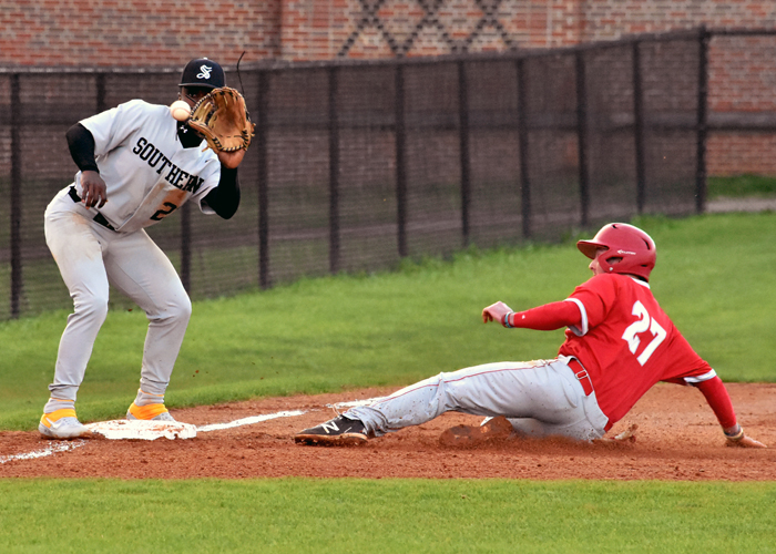 Cullen Stafford slides safely into third base during Huntingdon's 10-5 win over No. 3 Birmingham-Southern on Wednesday. (Photo by Wesley Lyle)