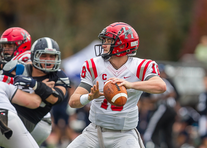 Quarterback Michael Lambert passed for 182 yards and three touchdowns in Saturday's 27-24 win over Berry in the first round of the NCAA Division III playoffs. (Photo by J & S Photography)