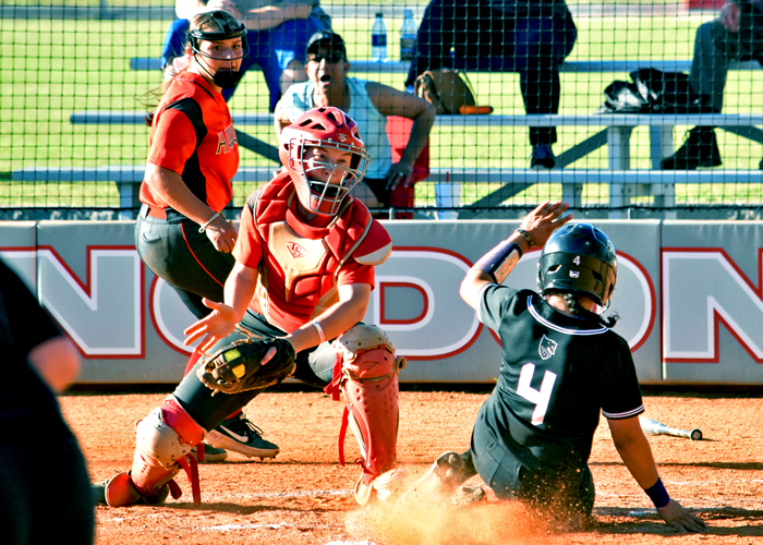Catcher Kaci Cochran makes a play at the plate to help the Huntingdon softball team preserve a 3-2 lead in Game 1 against Agnes Scott on Wednesday.