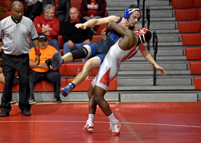 Quintez Pearson (149 pounds) won by major decision in Tuesday's match against Thomas More. (Photo by Wesley Lyle)
